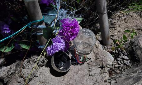 Wreath and light broken Godet burial ground